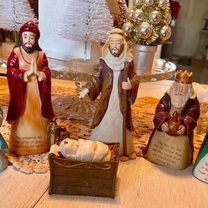 Nativity Scene Figurine Set with Red, Brown, and Gold Accents